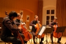 Die Vier EvangCellisten während ihres Konzertteils im Eröffnungs-Triptychon der 