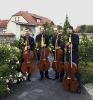 Die Vier EvangCellisten nach ihrem 100. Konzert in der Johanneskirche in Dreitzsch beim Festival 